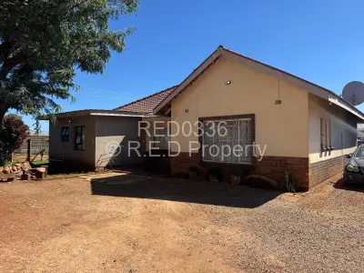 House For Sale in Queens Park East