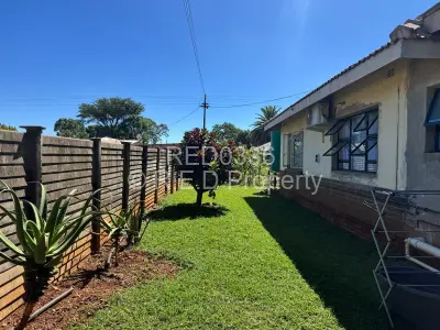 House For Sale in Queens Park East