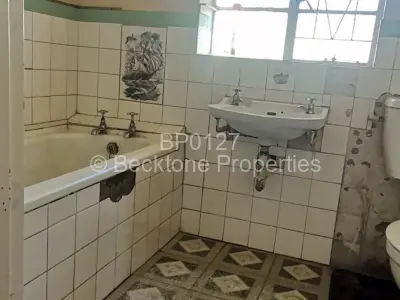 House For Sale in Queens Park East
