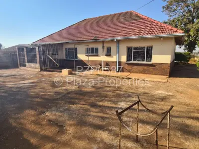 House For Sale in Queens Park East