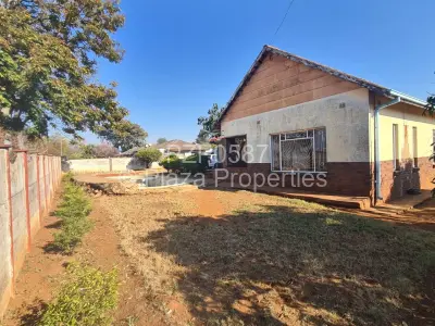 House For Sale in Queens Park East