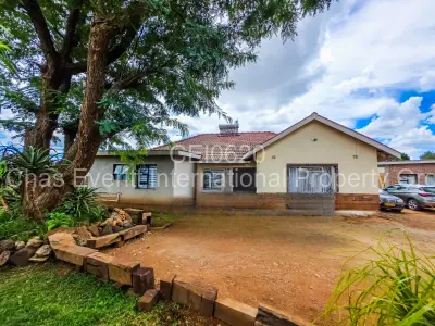 House For Sale in Queens Park East